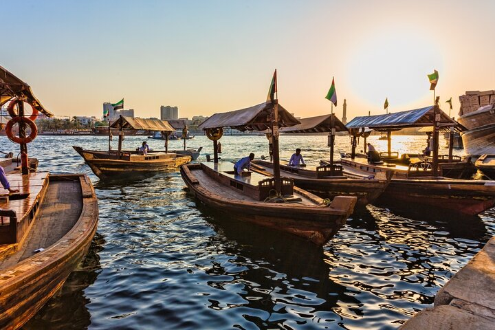 Experience the charm of traditional Dubai as you glide across the water in a classic Abra surrounded by stunning views and the rich heritage of the city. Perfect for adventure seekers!